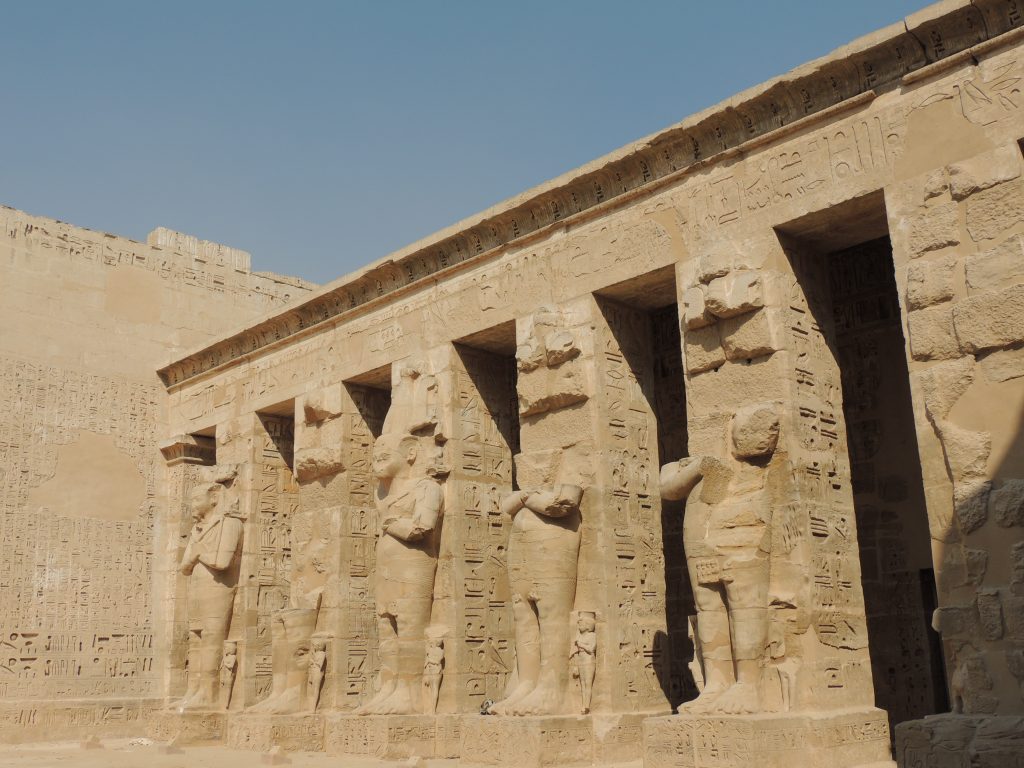 Osiride statues carved into columns at Kom Ombo Temple Egypt