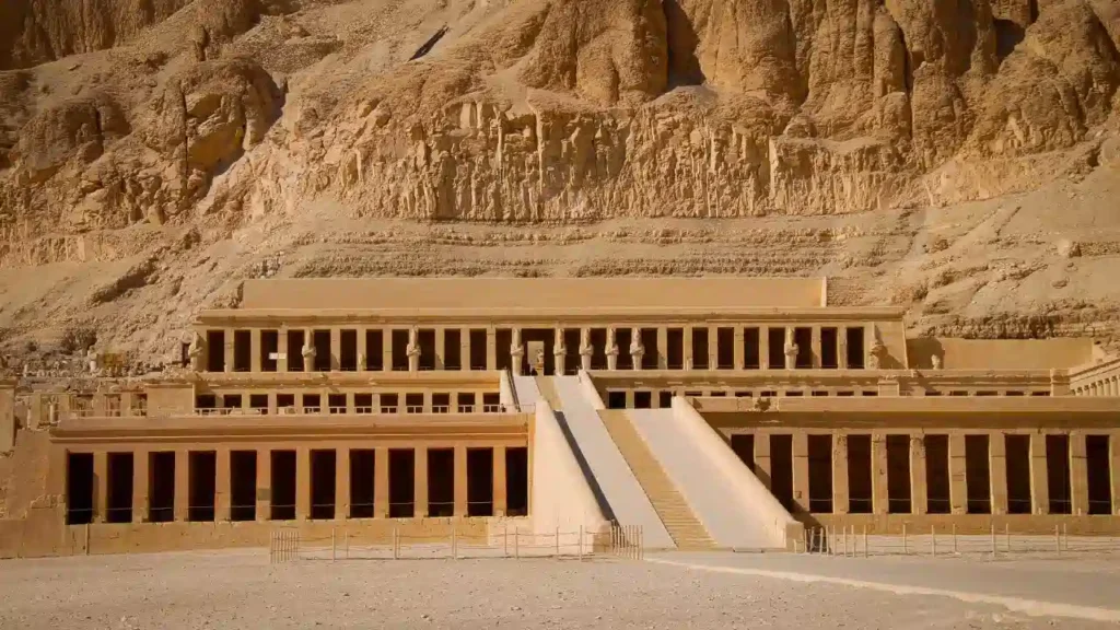 Panoramic view of the Temple of Queen Hatshepsut at Deir el Bahari in Luxor Egypt with terraces and desert cliffs in the background
