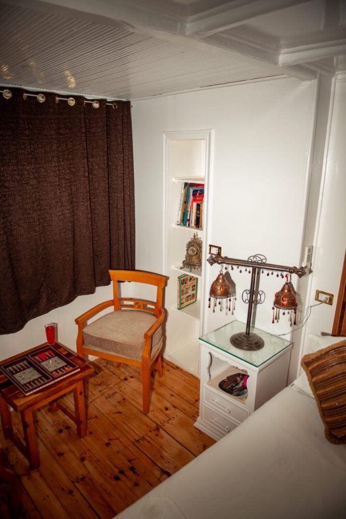 Cabin seating and reading corner on Princess Kelly dahabiya during Serket tour in Egypt