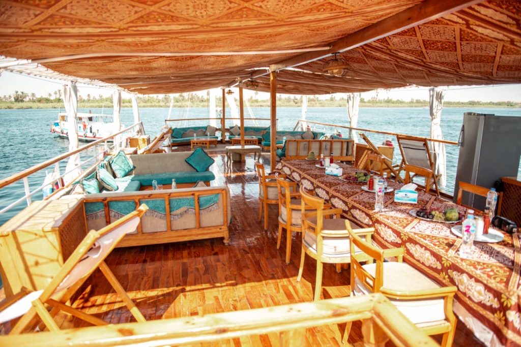 Dining and lounge deck area on Princess Kelly dahabiya during Serket tour on the Nile