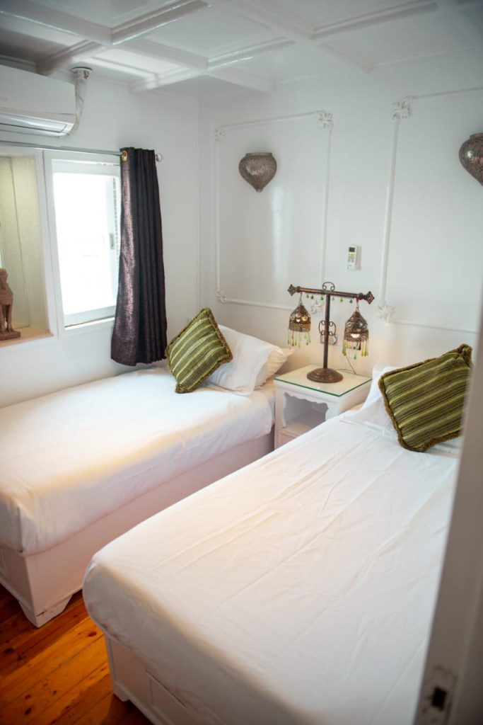 Elegant twin cabin on Princess Kelly dahabiya during Serket tour in Egypt