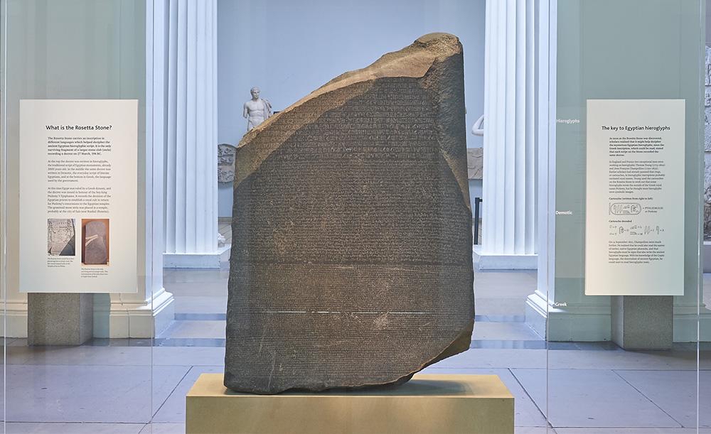 The Rosetta Stone displaying hieroglyphic, Demotic and Greek inscriptions that enabled the decipherment of Ancient Egyptian writing.